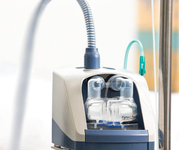 AIRVO 2 Table Photo of the AIRVO 2 on a table with a blurred background behind it.