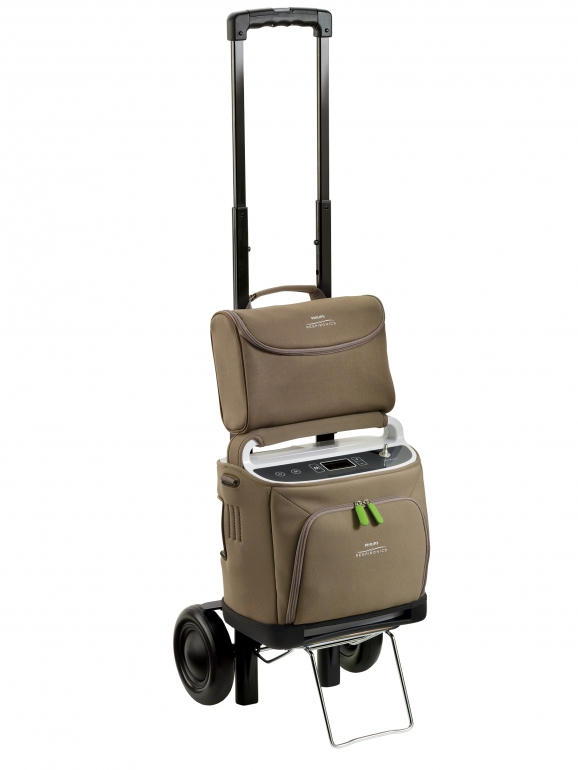 Photo of the SimplyGo Portable Oxygen Concentrator in a bag and cart.