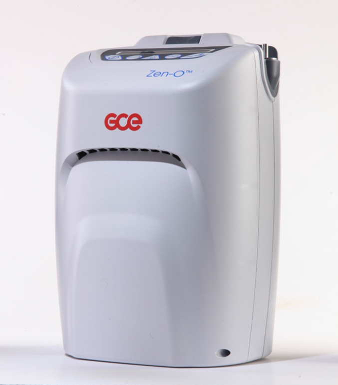 Photo of the Zen-O Portable Oxygen Concentrator on white background from a side view.