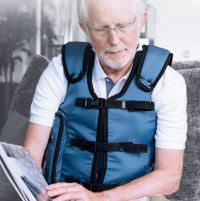 AffloVest Man thumbnail Photo of a man using the AffloVest. thumbnail