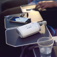 Photo of the AirMini AutoSet on a plane. thumbnail